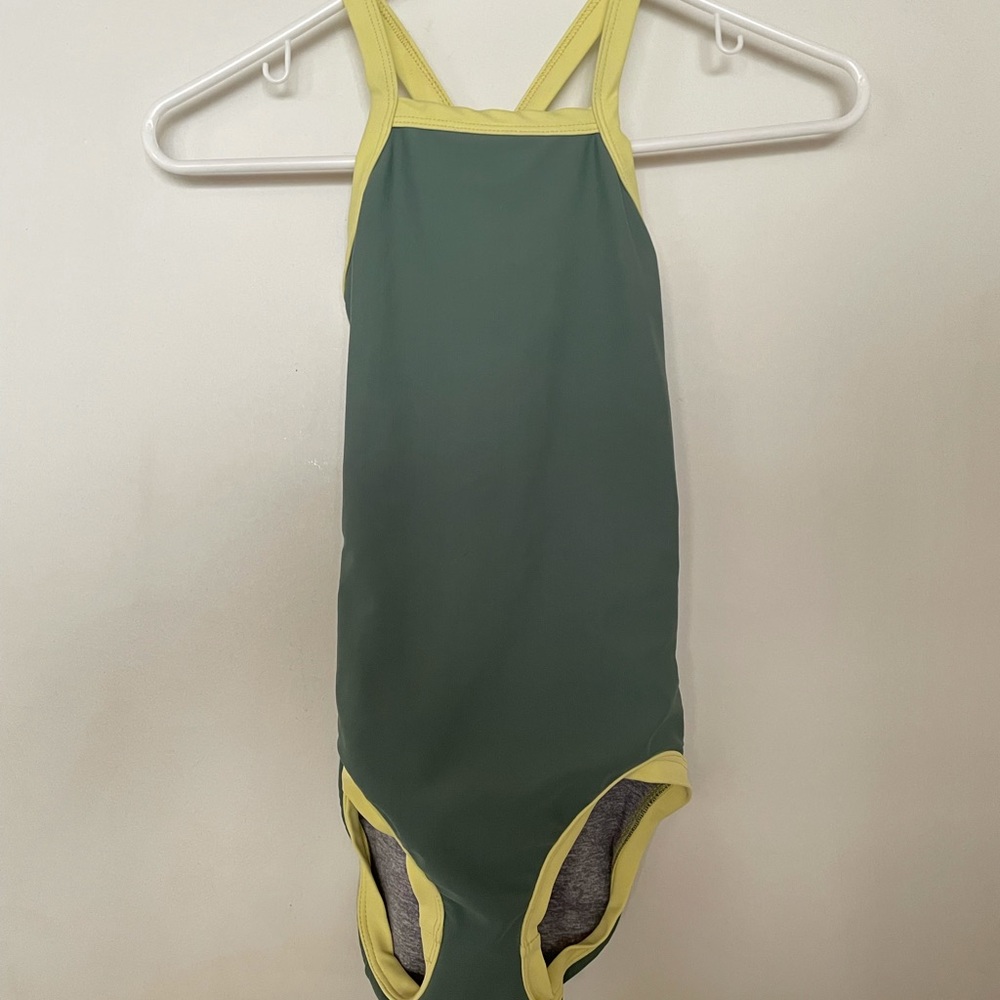 green and yellow crossed back leotard
